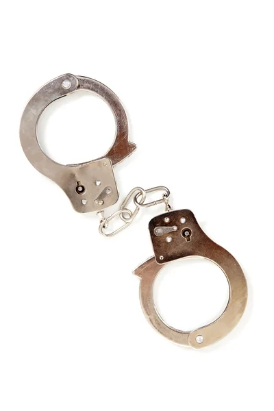 Silver handcuffs on a white background — Stock Photo, Image