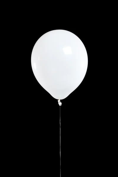 Weißer Partyballon auf schwarz — Stockfoto