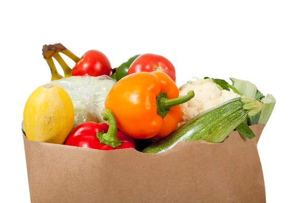 Paper grocery sack with vegetables on white — Stock Photo, Image