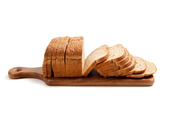 Bochenek chleba na stole chleba — Zdjęcie stockowe