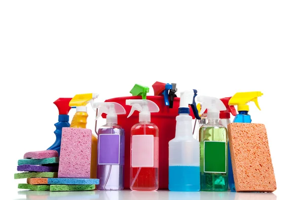 Various cleaning supplies on a white background — Stock Photo, Image