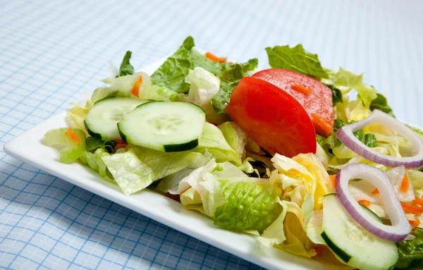 Tossed Salad on a plate with a fork — Stock Photo, Image