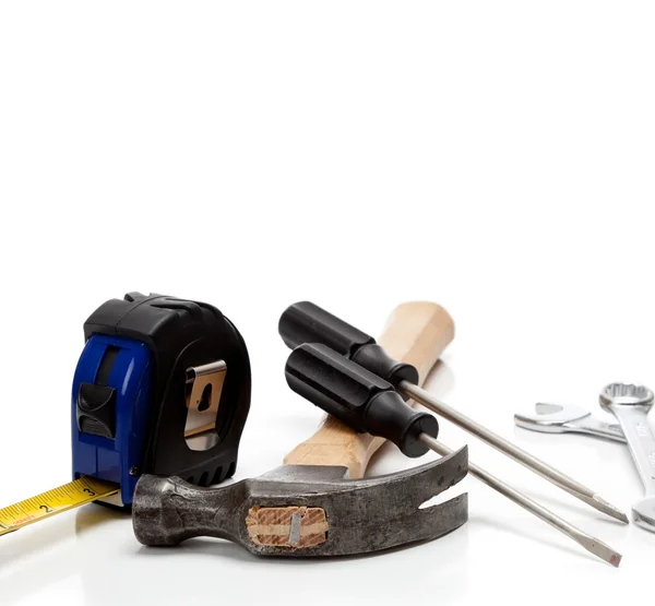 Various tools on a white background with copy space — Stock Photo, Image