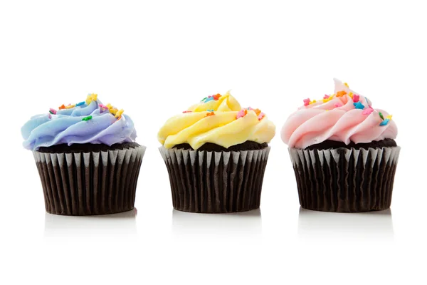 Pastel chocolate cupcakes on white — Stock Photo, Image