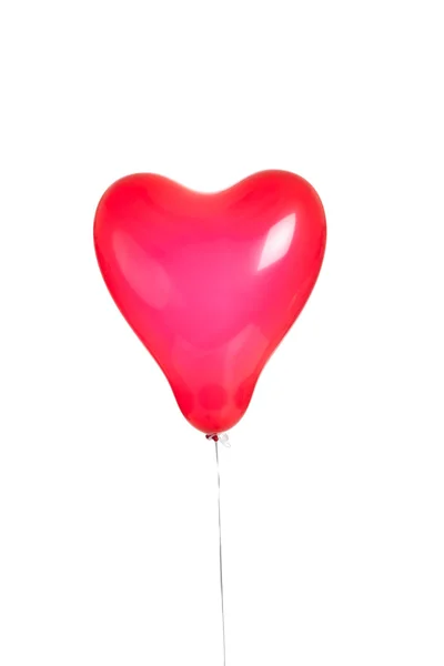 在白纸上的一个红色的心气球 — 图库照片