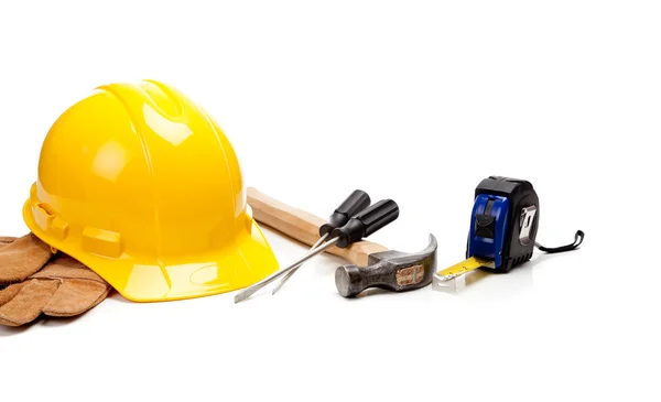 Hard hat, gloves and tools on a white background — Stock Photo, Image