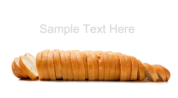 Plátky pečené francouzský chléb na bílém pozadí — Stock fotografie