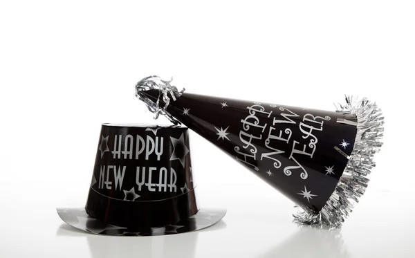 Black new year's eve hat on white — Stock Photo, Image