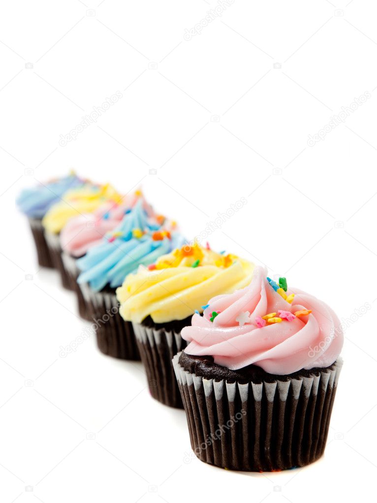 Pastel cupcakes on a white background