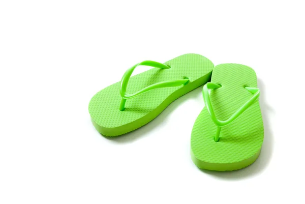 Farbige Flipflops auf weißem Hintergrund — Stockfoto