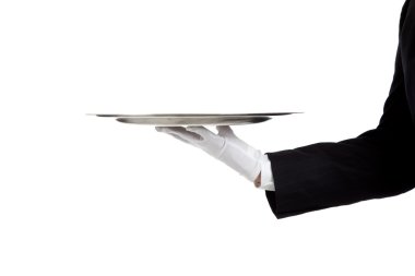 eldivenli elini tutan bir gümüş tepsi