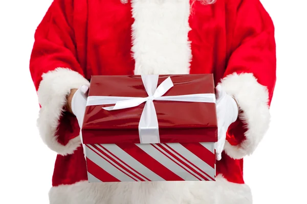 Санта Клаус дарит рождественские подарки — стоковое фото