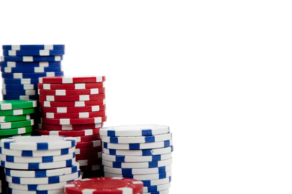 Stacks of poker chips on white with copy space — Stock Photo, Image