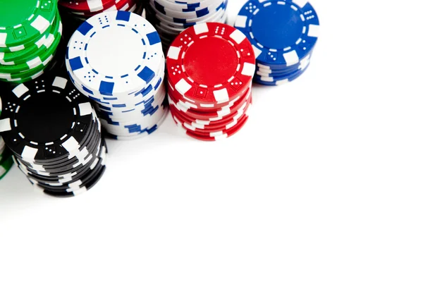 Stacks of poker chips on white with copy space — Stock Photo, Image