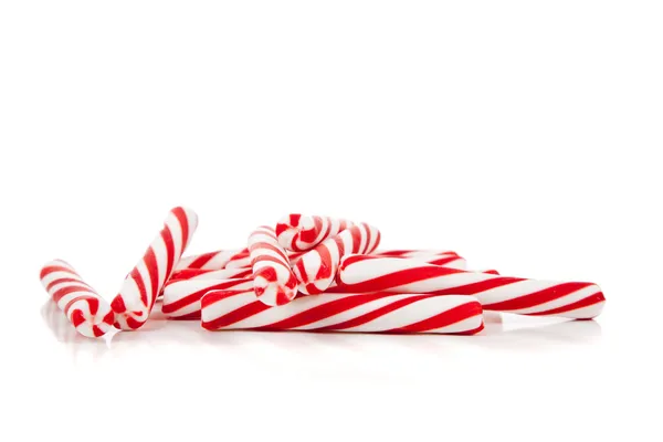 Red and white candy canes on white with copy space — Stock Photo, Image