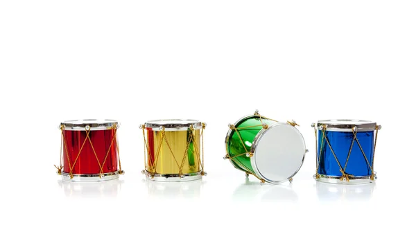 Miniature Christmas drums on white with copy space — Stock Photo, Image