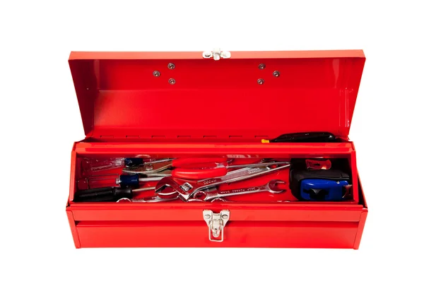 Red metal tool box with tools on white — Stock Photo, Image