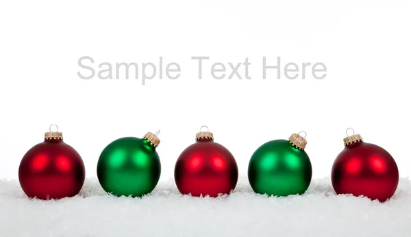 Green and red Christmas ornaments — Stock Photo, Image