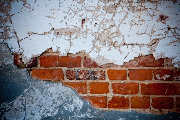 Antigua pared de ladrillo agrietado — Foto de Stock