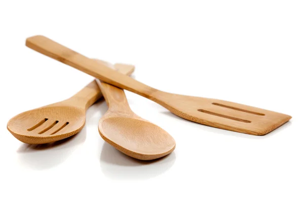 Wooden kitchen utensils on white — Stock Photo, Image