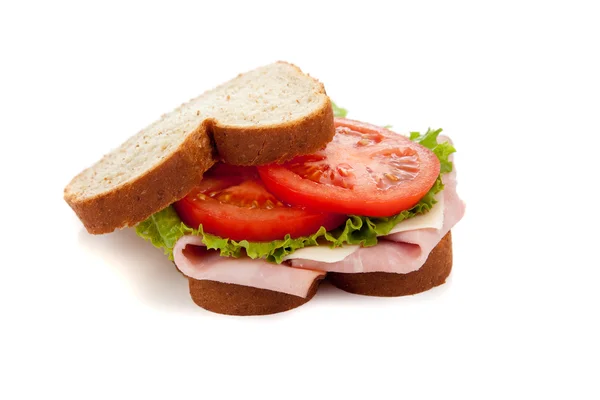 A ham sandwich on wheat on a white background — Stock Photo, Image