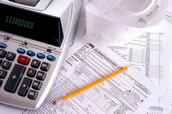 Adding Machine with tax forms — Stock Photo, Image