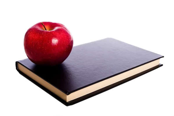 Libro escolar y Apple — Foto de Stock