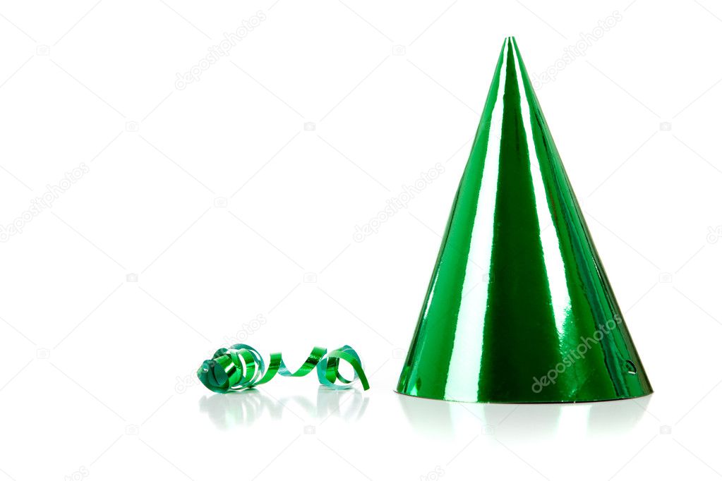 A green party hat and streamer on white