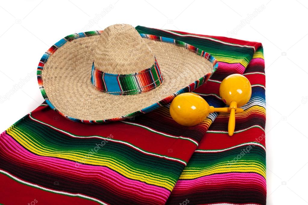 Serape, sombrero and maracas on a white background