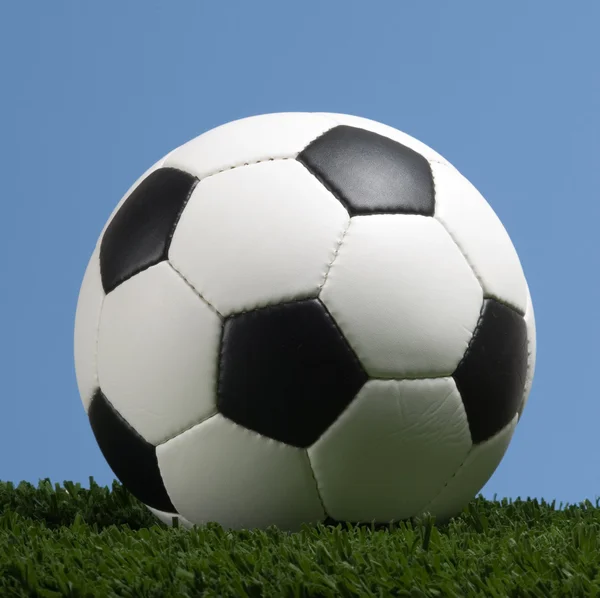 Football - Soccer ball against blue sky — Stock Photo, Image