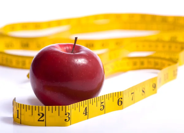 Red Apple and a Tape Measure — Stock Photo, Image