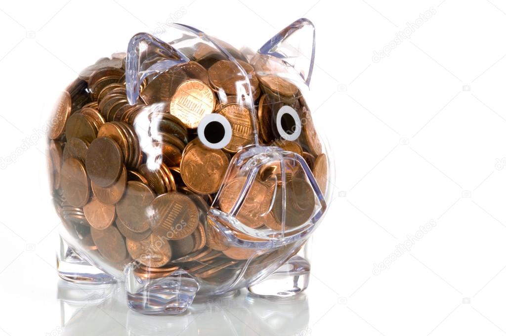 Clear Plastic piggy bank full of pennies