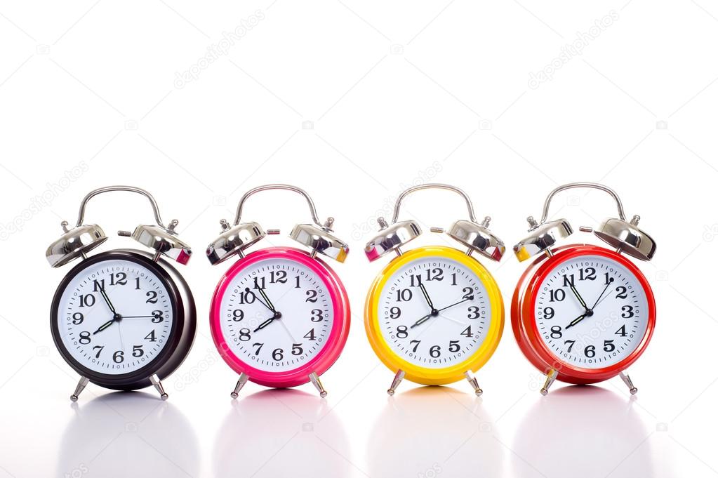 Row Of Alarm Clocks on WHite