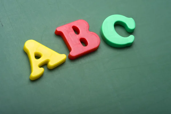 Alphabet letters on a Chalkboard — Stock Photo, Image