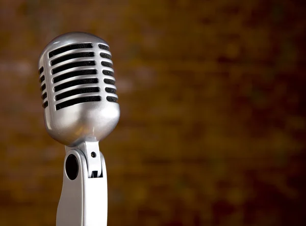 Vintage Microphone in front of blurred background — Stock Photo, Image