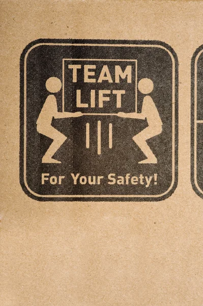 Етикетка безпеки на коробці — стокове фото