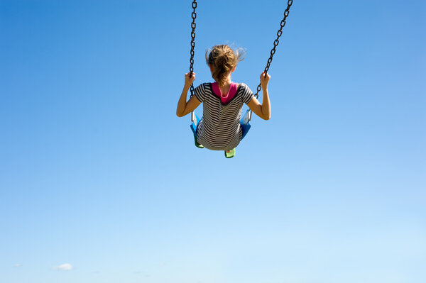 Young Girl on Swing