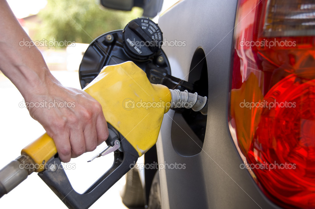 Pumping Gas or Petrol — Stock Photo © miflippo 13642237
