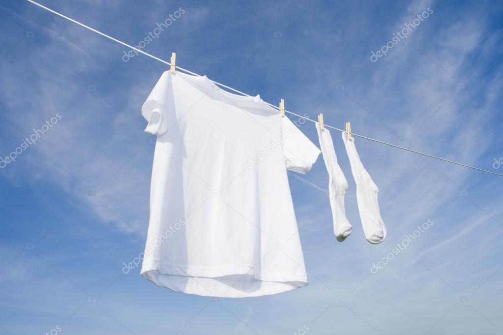 White T-Shirt and socks on Blue Sky