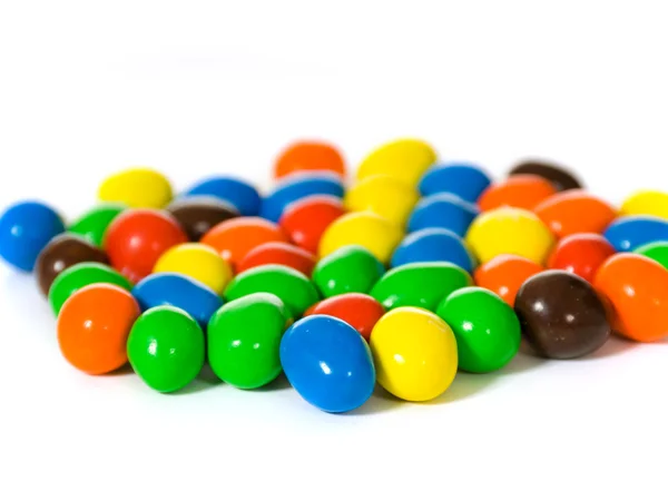 Caramelle di colore isolato su bianco — Foto Stock