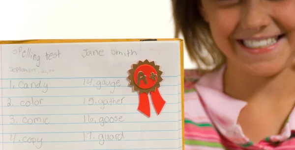 Young girl with spelling test — Stock Photo, Image