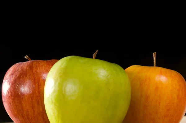 Variety apples on black — Stock Photo, Image