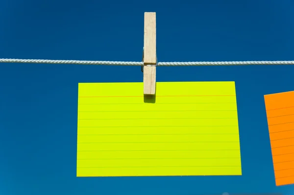 Four Sticky notes on a clothesline Stock Photo by ©miflippo 13931721