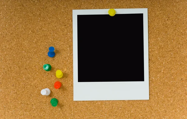 Polaroid picture on Corkboard — Stock Photo, Image