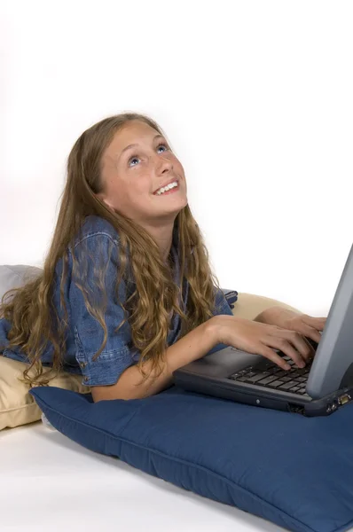 Girl working on laptop computer — Stock Photo, Image