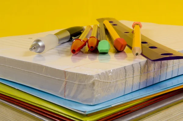 School Supplies on yellow background — Stock Photo, Image