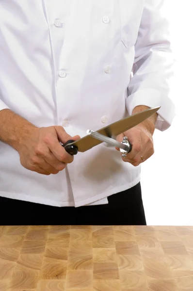 Chef - man sharpening knife — Stock Photo, Image