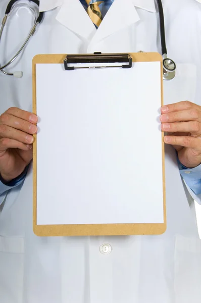 Doctor holding clipboard — Stock Photo, Image