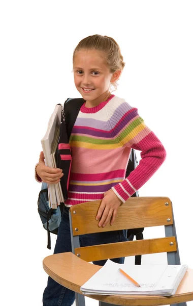 Menina da escola bonita com livros e mochila — Fotografia de Stock