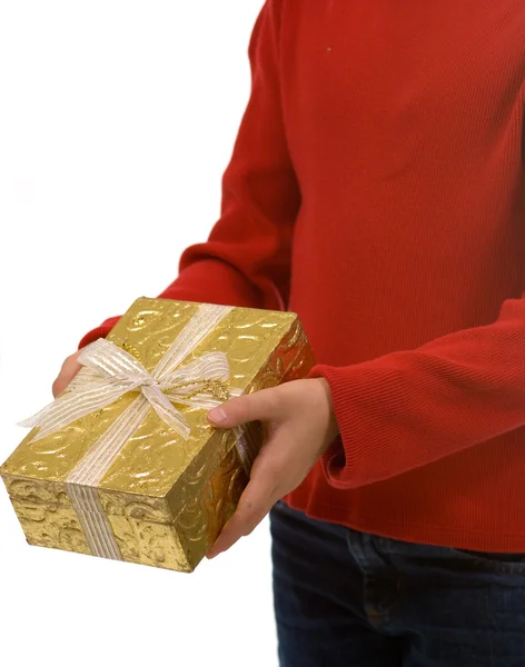Young girl in red with gold Christmas present — Stock Photo, Image